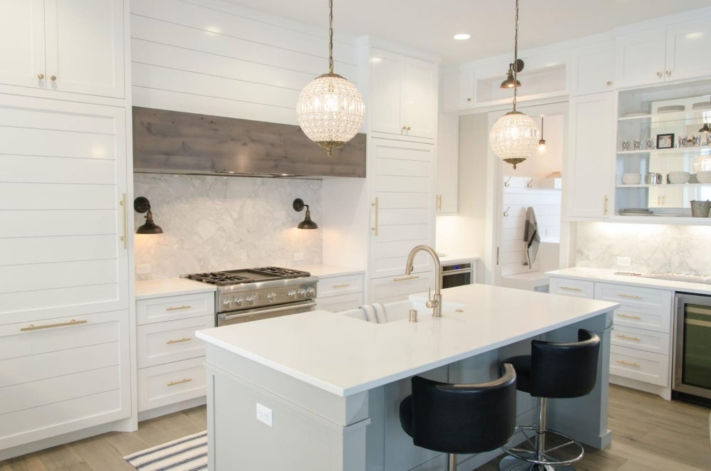 White kitchen with natural worktops 